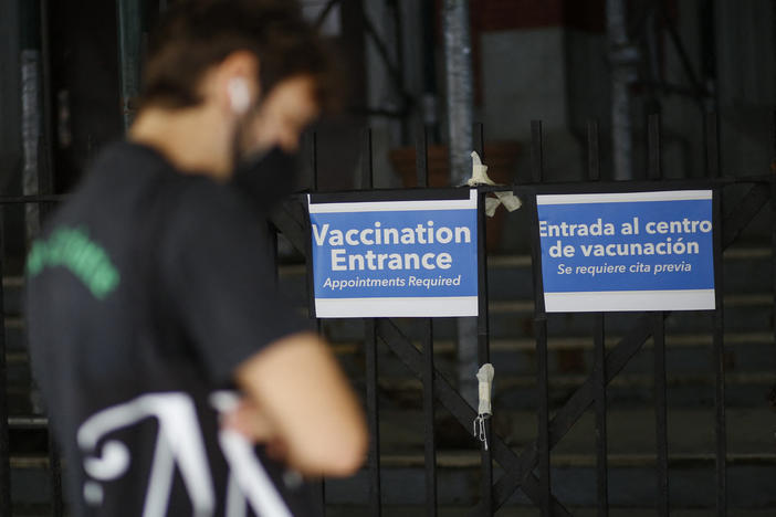 A man waits in line to receive a monkeypox vaccine in Brooklyn, N.Y., earlier this month.