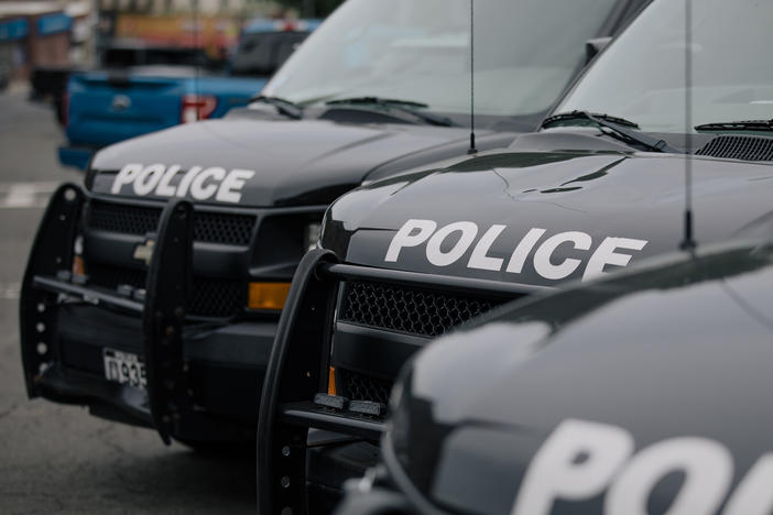 Police vehicles are parked outside the headquarters of the Yonkers Police Department in Yonkers, N.Y. Since 2007, the U.S. Department of Justice has been investigating the Yonkers Police Department and recommending areas for reform.