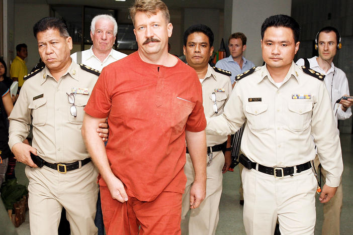 Russian arms dealer Viktor Bout is shown in custody in Bangkok, Thailand, in 2008. Bout was later extradited to the U.S. and convicted of conspiring to kill Americans. He's serving a 25-year sentence, but he may be part of a prisoner swap the U.S. and Russia are trying to negotiate.