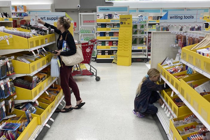 People shop for school supplies at a Target store in Miami, Fla., on July 27.