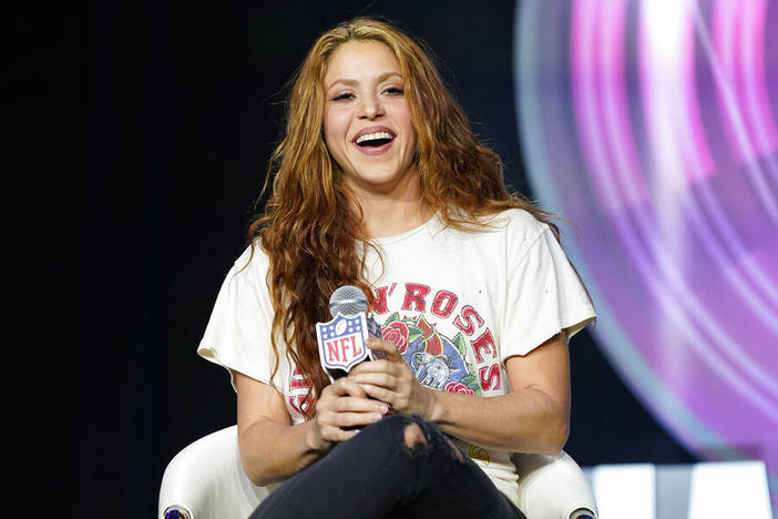 Performer Shakira answers questions at a news conference on Jan. 30, 2020, in Miami. Spanish prosecutors are seeking a prison sentence of eight years for Colombian-born pop star Shakira in her expected trial for alleged tax fraud. Shakira is charged for failing to pay 14.5 million euros ($15 million) in taxes in Spain between 2012 and 2014.