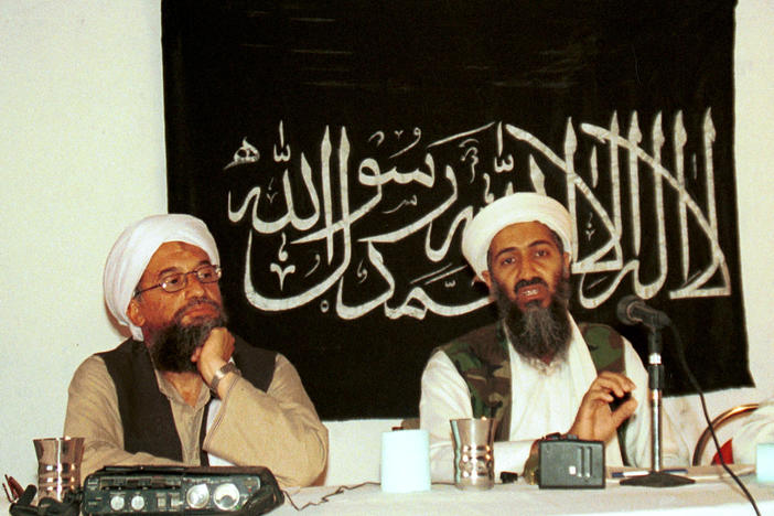 In this 1998 file photo, Ayman al-Zawahiri (left) holds a press conference with Osama bin Laden in Khost, Afghanistan. Zawahiri succeeded bin Laden as al-Qaida's leader following the 2011 U.S. raid that killed bin Laden in Pakistan.