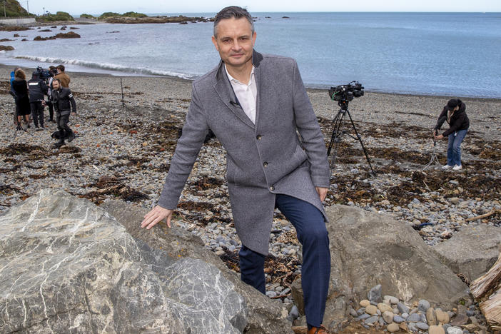 New Zealand Climate Change Minister James Shaw poses for a photo at Owhiro Bay beach in Wellington, New Zealand, Wednesday, Aug. 3, 2022.