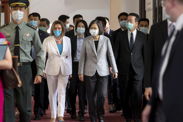 U.S. House Speaker Nancy Pelosi, center left, and Taiwanese President President Tsai Ing-wen arrive for a meeting in Taipei, Taiwan, Wednesday, Aug. 3, 2022.