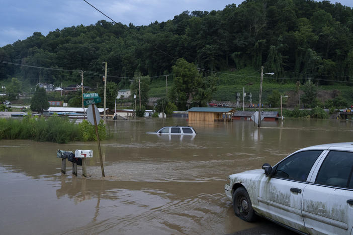 Vehicles after a flood in July 2022 in Jackson, Ky. Deadly floods in the region were caused by very heavy rain.