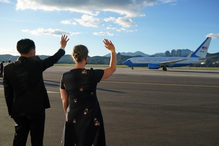 A plane carrying House Speaker Nancy Pelosi and her delegation departs Taipei on Wednesday.