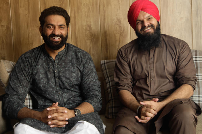 Friends Nasir Dhillon (left) and Papinder Singh run a YouTube channel, Punjabi Lehar, that tries to heal the wounds of Partition through reuniting loved ones separated when British-ruled India was divided into two countries, India and Pakistan, 75 years ago.