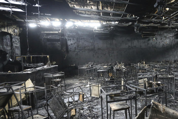 Major fire damage fills the interior at the Mountain B pub in the Sattahip district of Chonburi province, about 100 miles southeast of Bangkok, Thailand.