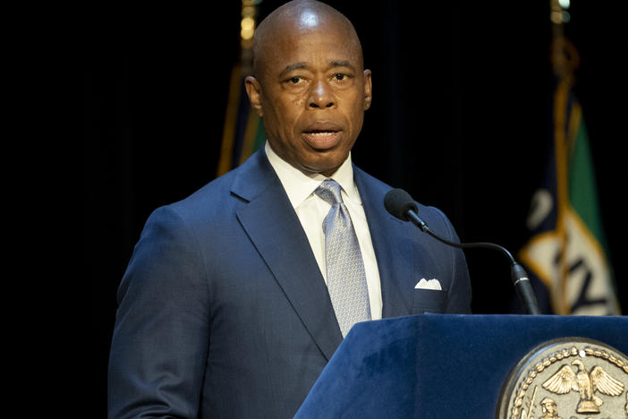 Mayor Eric Adams speaks during a graduation ceremony at Madison Square Garden in July in New York. Adams is critical of Texas Gov. Greg Abbott as he sends busloads of migrants from Texas to New York City.