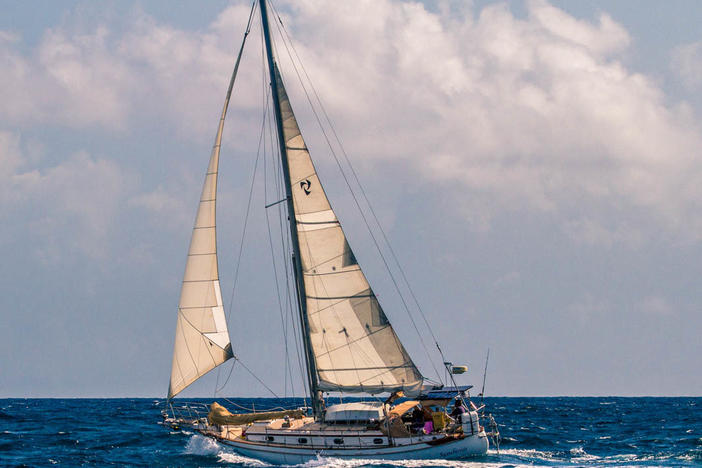 Author Scott Neuman's sailboat, Symbiosis, on passage between St. Lucia and Martinique in 2017.