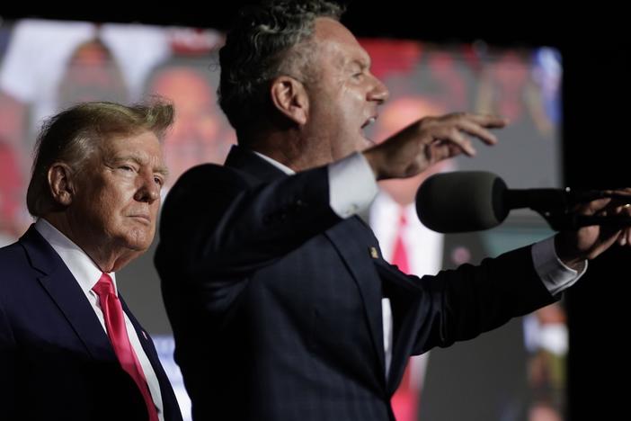 Tim Michels, Wisconsin Republican candidate for governor, right, speaks as former President Donald Trump listens at a rally Friday, Aug. 5, 2022, in Waukesha, Wisc.