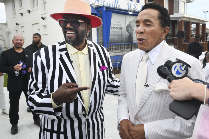 Original Temptation Otis Williams, left, and Smokey Robinson speak in front of the Motown Museum in Detroit, Monday, Aug. 8, 2022.