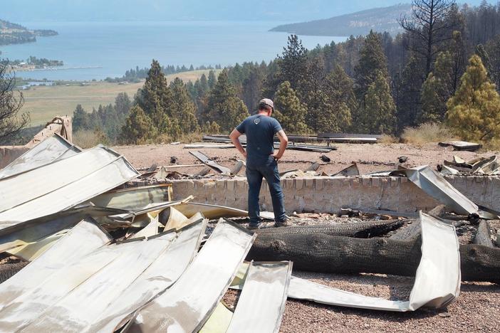 Steve Holett surveys the aftermath of the Elmo 2 Fire at his property, where he had spent the last 18 months building a home.