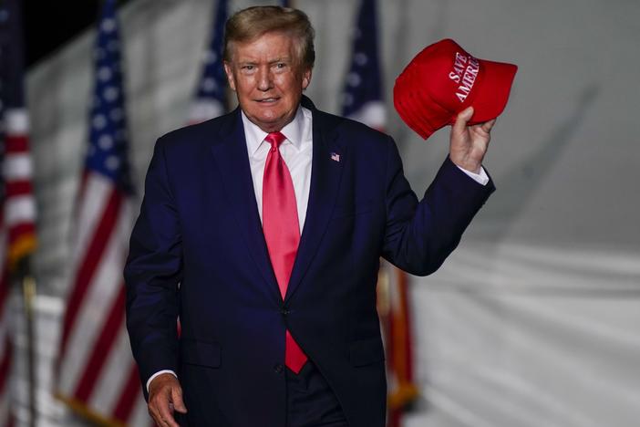 Former President Trump arrives at a rally Friday, Aug. 5, in Wisconsin. Trump has been the subject of several ongoing investigations into his businesses and actions while in the White House.