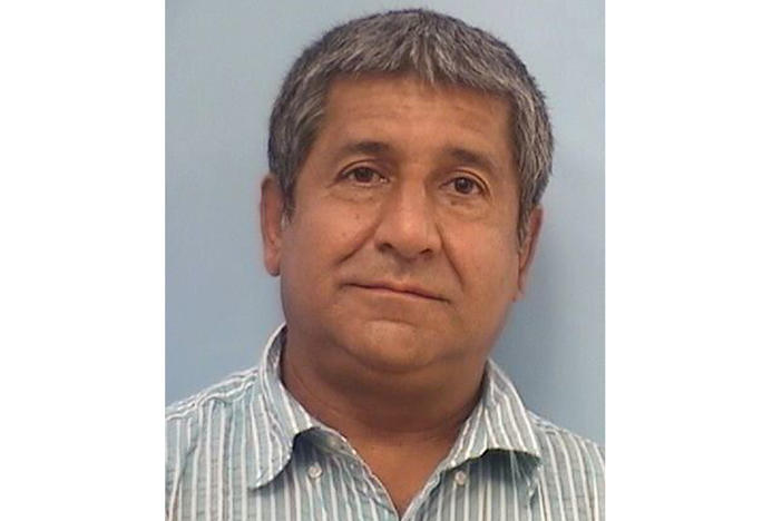 Muhammad Syed, 51, was taken into custody Monday in connection with the killings of four Muslim men in Albuquerque, N.M., over the last nine months. He faces charges in two of the deaths and may be charged in the others.