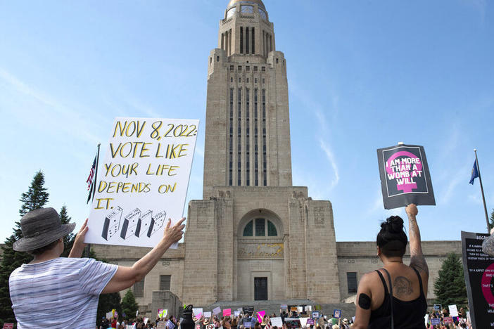 Protesters line the street June 4 around the front of the Nebraska State Capitol during an Abortion Rights Rally in Lincoln, Neb.