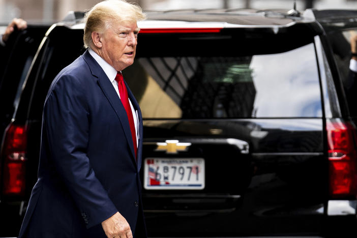 Former President Donald Trump departs Trump Tower on Wednesday in New York, on his way to the New York attorney general's office for a deposition in a civil investigation.