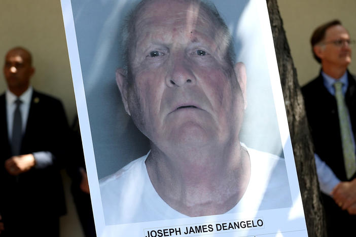 A photo of Joseph James DeAngelo Jr. is displayed during a news conference April 24, 2018, in Sacramento, Calif., announcing the arrest of the man suspected to be the so-called Golden State Killer.