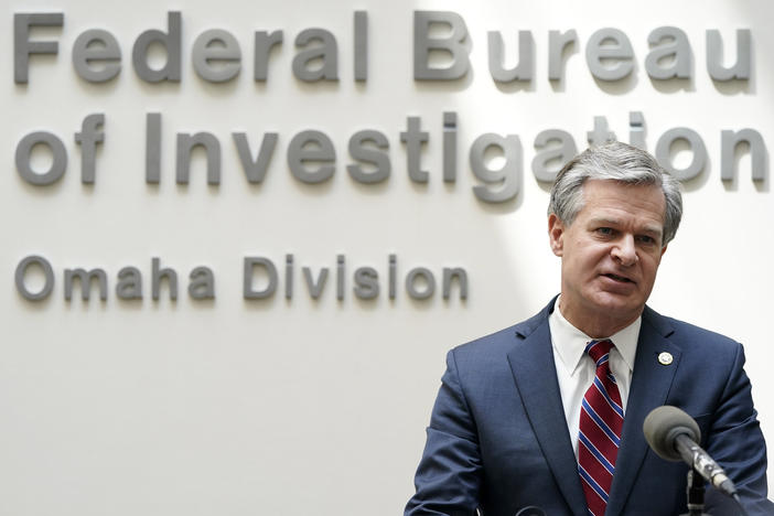 FBI Director Christopher Wray speaks during a news conference Wednesday in Omaha, Neb.