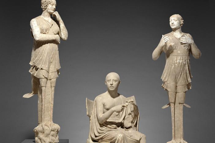 This undated photo provided by The J. Paul Getty Museum shows Sculptural Group of a Seated Poet and Sirens.