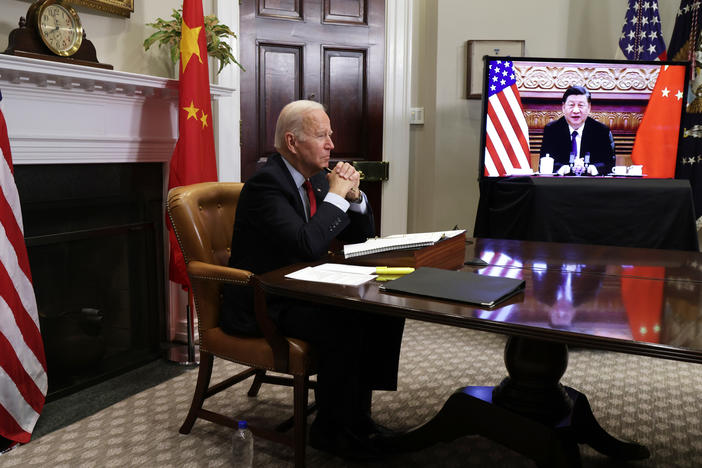 Since he took office, President Biden has only been able to meet with Chinese President Xi Jinping virtually — like in this Nov. 2021 file photo — or by phone.