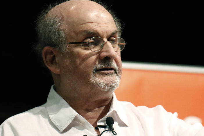 Author Salman Rushdie, pictured in 2018, is expected to survive a stabbing attack, his agent says.