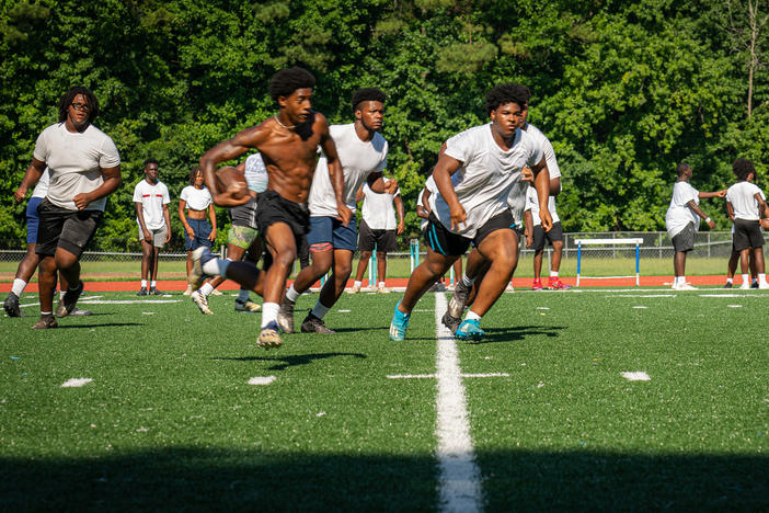 Football players at Cedar Grove High School in DeKalb County start practice in late July without pads to give them an acclimatization period to get used to the heat. This is a statewide rule from the Georgia High School Association.
