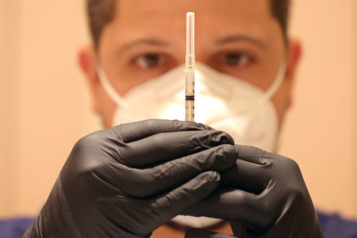 The federal government wants to roll out another round of COVID-19 boosters this fall but drugmakers are still testing the new boosters. The Food and Drug Administration has said it will base its evaluation of the boosters on data from mouse studies, in a controversial move.