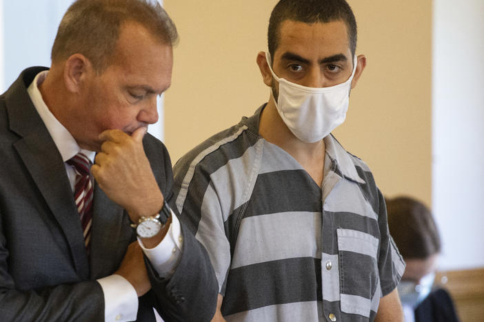 Defense attorney Nathaniel Barone (left) and Hadi Matar, who was charged with stabbing author Salman Rushdie, listen during an arraignment Thursday in the Chautauqua County Courthouse in Mayville, N.Y.