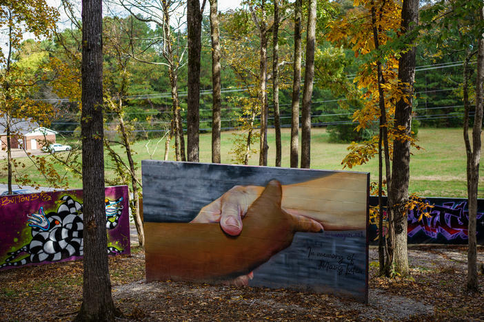 A mural in memory of Mary Luten, 59, who died while saving others in the Waverly flood, sits on display at The Walls Art Park. The flood on Aug. 21, 2021, killed 20 people and damaged more than 700 homes.