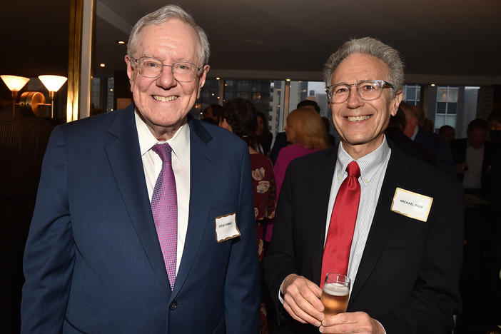 An inspector general said the the investigation of officials at U.S. Agency for Global Media conducted by a private law firm for former CEO Michael Pack was a "waste or gross waste" of taxpayer money. The law firm charged the agency more than $1.6 million. The officials under review by Pack, shown above at a party earlier this year with Steve Forbes, were later exonerated.