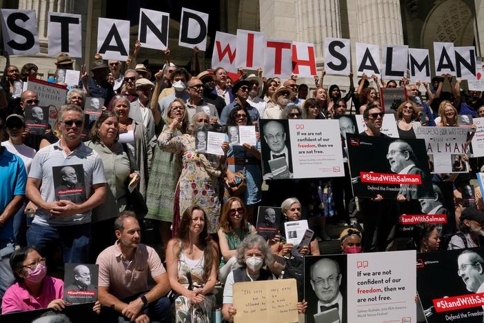 At a rally outside the New York Public Library, writers including Paul Auster and Gay Talese read passages from Salman Rushdie's work. His assailant has pleaded not guilty to attempted murder charges after being accused of stabbing Rushdie during a literary event at the Chautauqua Institution.