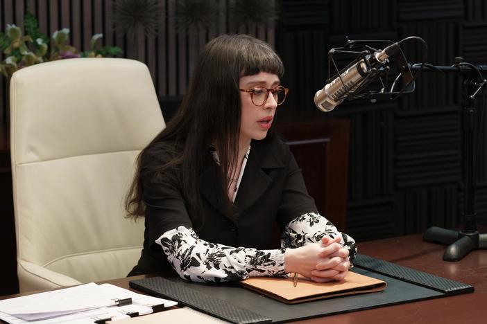 Poppy, played by Adina Verson, works as the beleaguered assistant to morally dubious podcaster Cinda Canning in the hit Hulu series <em>Only Murders In the Building</em>.