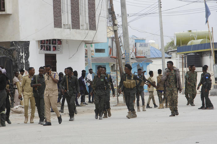 Soldiers patrol outside the Hayat Hotel in Mogadishu, Somalia, on Saturday.