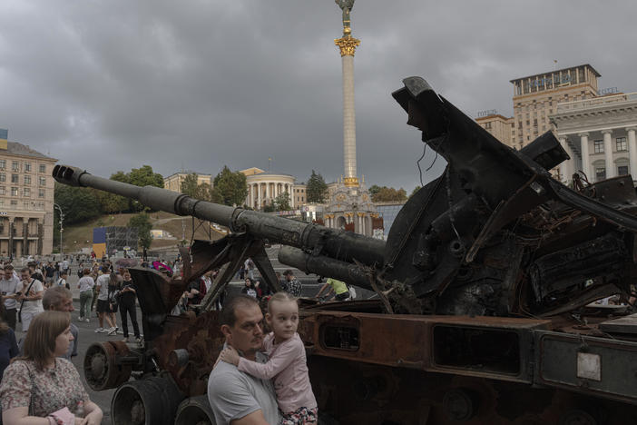 Ukrainians visit an avenue where destroyed Russian military hardware is displayed in Kyiv, Ukraine, on Saturday.