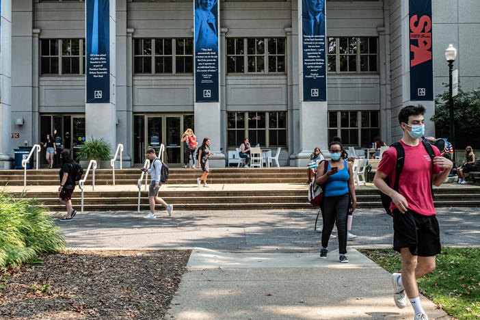 Hundreds of staff members at American University in Washington, D.C., say they are planning to go on strike Monday over complaints of unfair working conditions and low wages. Here, students are seen walking on campus.