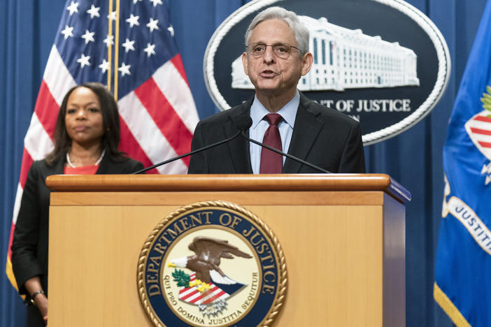 Attorney General Merrick Garland with Assistant Attorney General Kristen Clarke for the Civil Rights Division, speaks during a news conference at the Department of Justice in Washington, on Aug. 4.