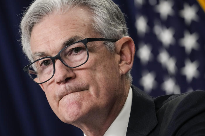 Federal Reserve Chair Jerome Powell speaks during a news conference following a Fed policy meeting in Washington, D.C., on July 27. Powell warned on Friday the central bank is committed to bring down inflation even if it causes some economic pain.