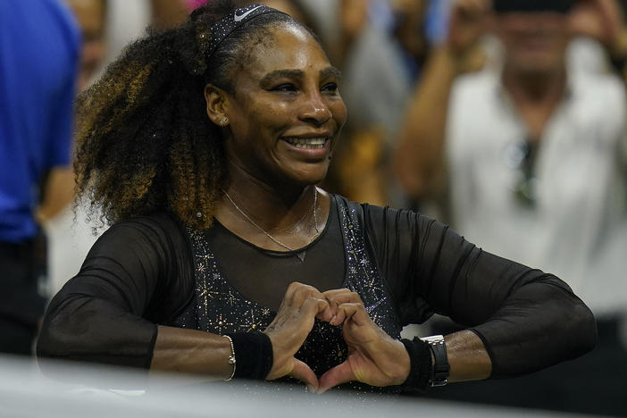 Serena Williams, of the United States, makes a heart with her hands after defeating Danka Kovinic, of Montenegro, during the first round of the US Open tennis championships, Monday, Aug. 29, 2022, in New York.