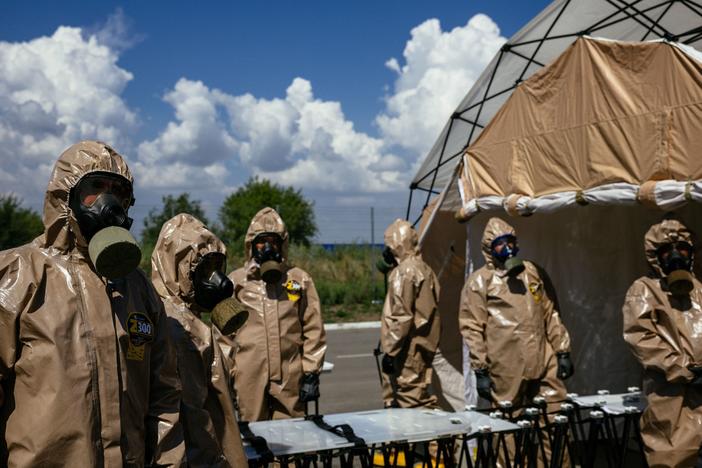 Ukrainian Emergency Ministry rescuers attend an exercise in the city of Zaporizhzhia on Aug. 17, in case of a possible nuclear incident at the Zaporizhzhia nuclear power plant located near the city. The plant in southern Ukraine came under Russian occupation in the early days of the war.