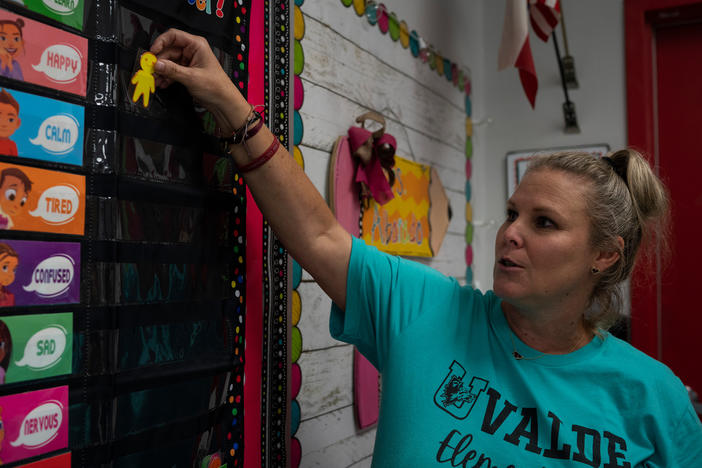 Nicole Ogburn shows the new tool that she will use this year to know the emotional state of her students.