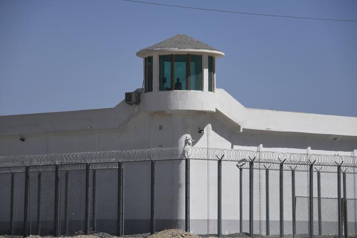 This photo taken on May 31, 2019 shows a watchtower on a high-security facility near what is believed to be a re-education camp where mostly Muslim ethnic minorities are detained, on the outskirts of Hotan, in China's northwestern Xinjiang region. As many as one million ethnic Uyghurs and other mostly Muslim minorities are believed to be held in a network of internment camps in Xinjiang.