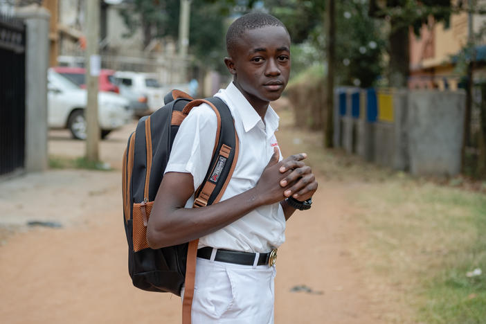 Kusemererwa Jonathan Henry, 16, runs a fruit-and-vegetable stand that is helping pay school fees. He wants to be an electrical engineer.