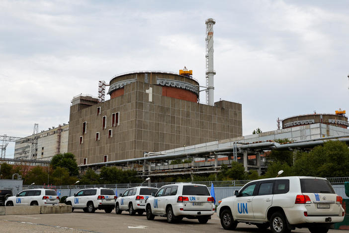 A motorcade transporting the International Atomic Energy Agency expert mission, escorted by the Russian military, arrives at the Zaporizhzhia Nuclear Power Plant amid the conflict in Ukraine, outside the city of Enerhodar, Ukraine, on Thursday.