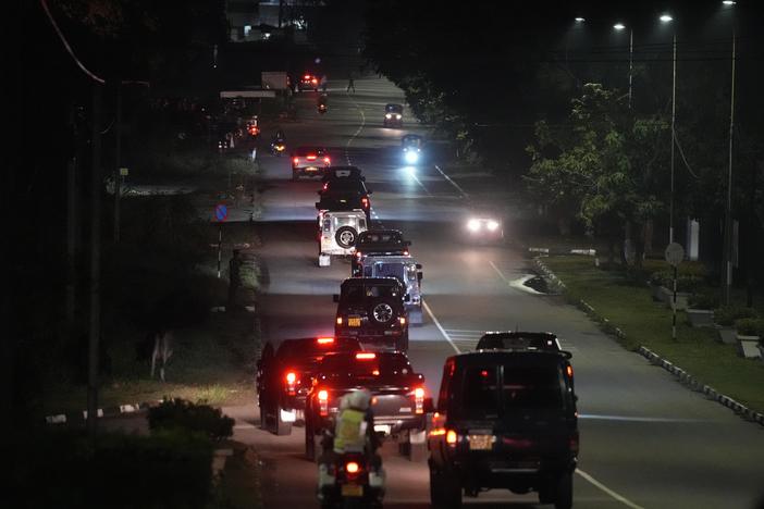 A motorcade believed to be conveying Sri Lanka's former president, Gotabaya Rajapaksa, leaves the Bandaranaike International airport in Colombo, Sri Lanka, on Saturday.