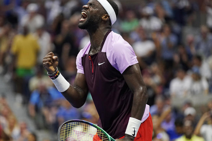 Frances Tiafoe of the United States celebrates after winning a point against Rafael Nadal, of Spain, during the fourth round of the U.S. Open tennis championships, Monday, Sept. 5, 2022, in New York.