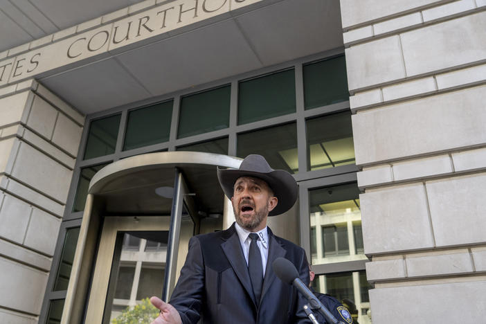 Couy Griffin, a county commissioner in Otero County, New Mexico, speaks on June 17 outside federal court in Washington, D.C., where he was convicted of entering a restricted area during the Jan. 6 riot at the Capitol.