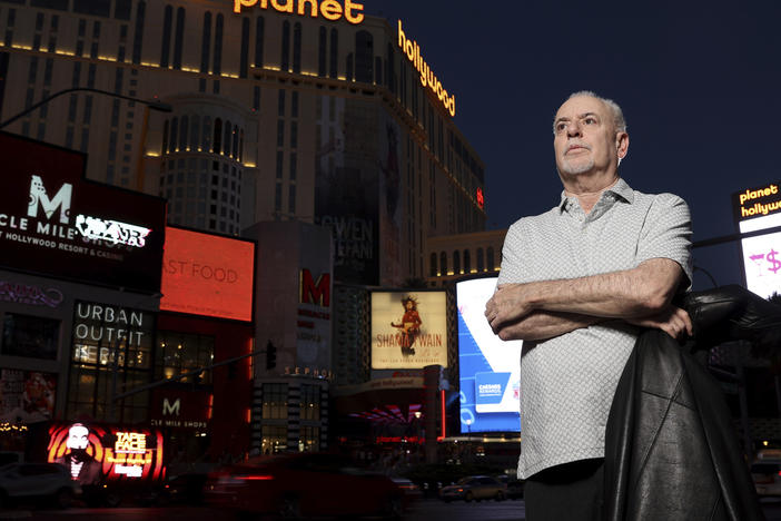 Jeff German, host of "Mobbed Up," poses with Planet Hollywood, formerly the Aladdin, in the background on the Strip in Las Vegas, June 2, 2021.