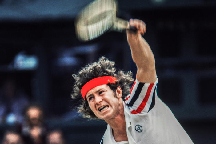 John McEnroe competes at Wimbledon in 1980.