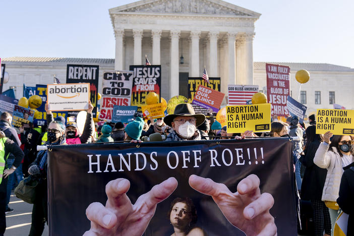 Abortion rights advocates and anti-abortion protesters demonstrate in front of the U.S. Supreme Court on Dec. 1, 2021. Heading in the 2022 midterm elections, abortion leads as the top issue for Democrats. For Republicans, it is inflation. For independents, inflation also tops and abortion ranks second.